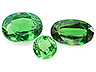 Tsavorite  Mixed shapes Moderately to Heavily included